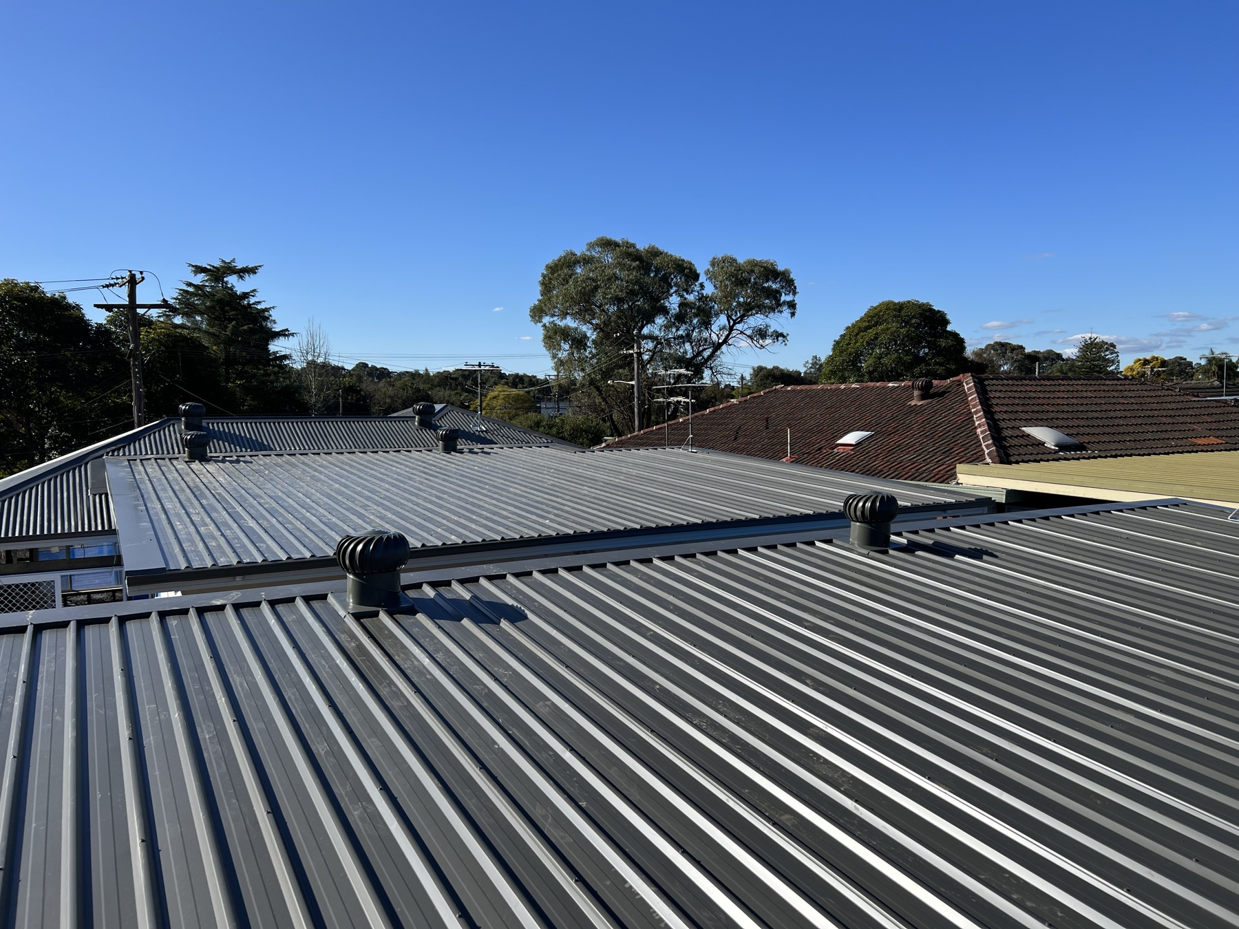 Tile to metal re-roof, Rockdale